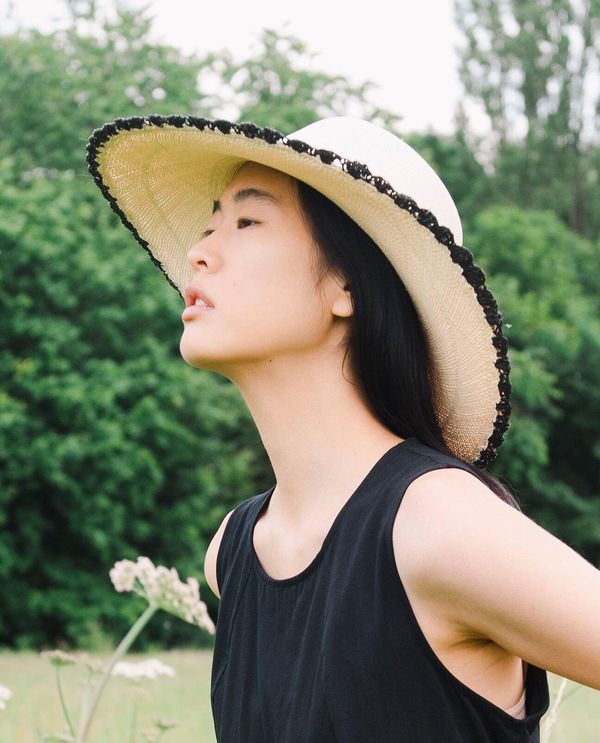 image of Circular Hat with Crochet Trim in Black