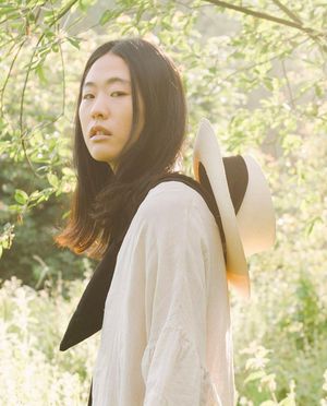 Wide Brim Hat with Black Tie
