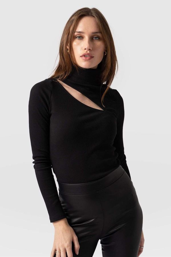 image of Reveal Roll Neck in Black