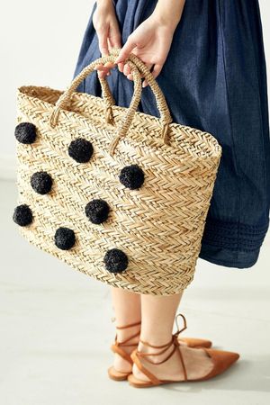 Erice Eco Straw Pom Pom Tote Bag in Beige