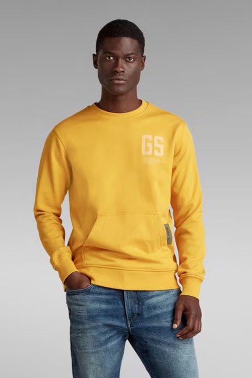 mens recycled polyester and sustainable cotton stitch pocket sweater in yellow gold