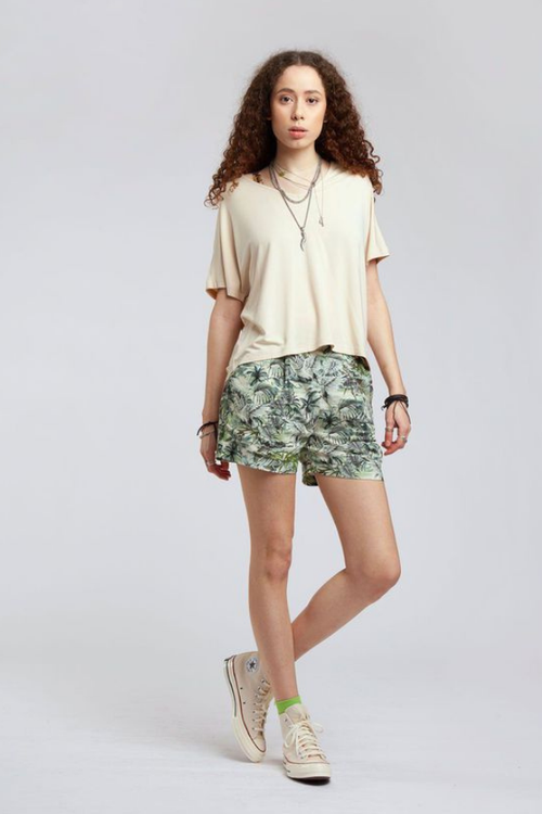 muni organic linen shorts in a green Bali inspired floral print