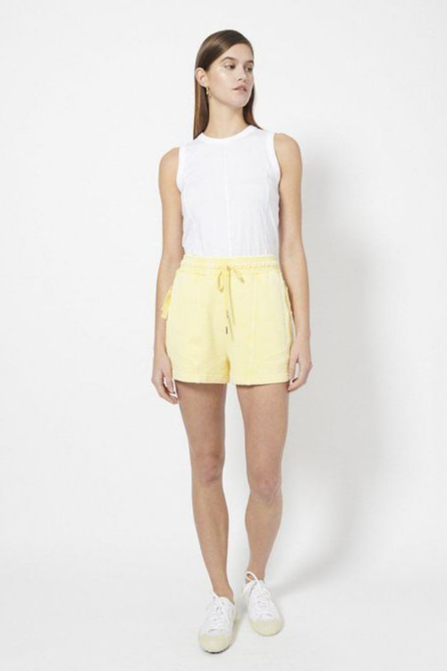 organic cotton panelled garment dyed shorts in sunshine yellow
