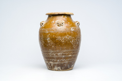 A Chinese stoneware martaban jar with incised design, 19th C.