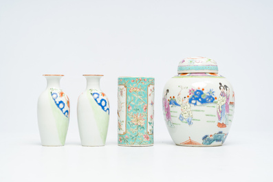 A Chinese famille rose brush pot, a jar and cover with figures in a garden and a pair of 'Immortals' vases, 19th/20th C.