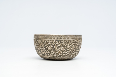 A Thai or Chinese floral silver bowl bearing an inscription and a mark, 19th/20th C.