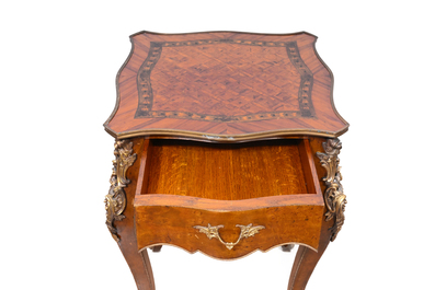 A French burl walnut veneered marquetry and parquetry gilt bronze mounted side table, first half 20th C.