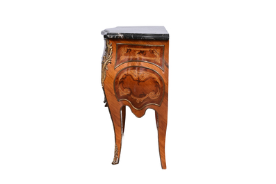 A French gilt bronze-mounted marqueterie Louis XV style chest of drawers with black marble top, 20th C.