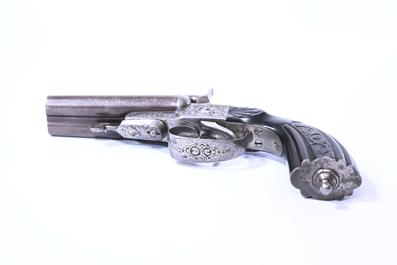 A French double barrel pinfire pistol with engraved lock and sculpted stock, marked Roissy, 19th C.