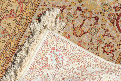 A Turkish Hereke rug with floral design in silk and gold thread, 20th C.