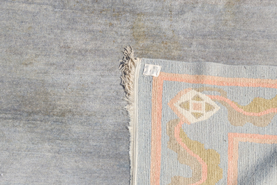 A Nepalese wool Kangri rug with floral design, 20th C.