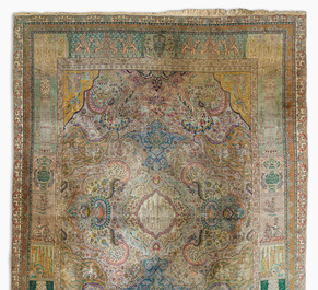 A Persian Tabriz rug with floral design and many references to ancient Persian culture, wool on cotton, 20th C.