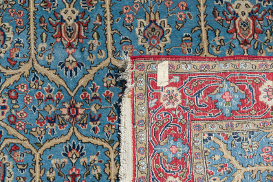 A Persian Qom (Qum/Ghom) Kork rug with floral design, wool on cotton, 20th C.