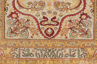 A Turkish Hereke rug with floral design in silk and gold thread, 20th C.