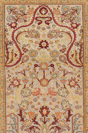A Turkish Hereke rug with floral design in silk and gold thread, 20th C.
