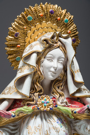 Eugenio Pattarino (1885-1971): Madonna adored by angels, polychrome decorated and gilt terracotta