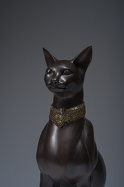 A. Tiot (20&egrave;me/21&egrave;me si&egrave;cle): Quatre statues de Bastet, bronze &agrave; patine brune