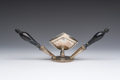 An Empire style silver ember bowl with ebonized wooden handles, 19th C.