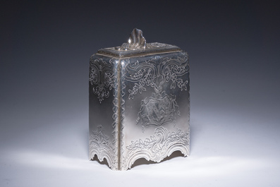 A rare English George II tea caddy with richly engraved floral design and coats of arms, London, maker's mark Paul de Lamerie, dated 1745