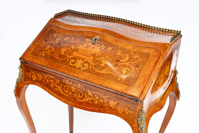A French Louis XV style gilt bronze mounted ladies' writing desk with rich marquetry, 19th C.