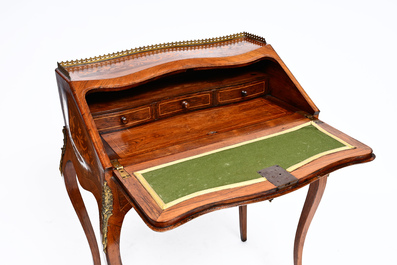 A French Louis XV style gilt bronze mounted ladies' writing desk with rich marquetry, 19th C.