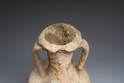 A large Roman terracotta oil amphora of the 'Dressel 3' type, 1st-3rd C.