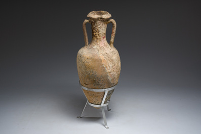 A large Roman terracotta oil amphora of the 'Dressel 3' type, 1st-3rd C.