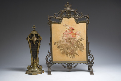 Deux &eacute;crans de chemin&eacute;e en bronze partiellement dor&eacute; dont un avec un panneau brod&eacute;, France, 19&egrave;me si&egrave;cle