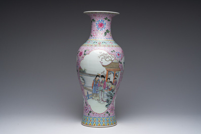 A Chinese famille rose baluster vase with female Immortals and floral design, Qianlong mark, 20th C.