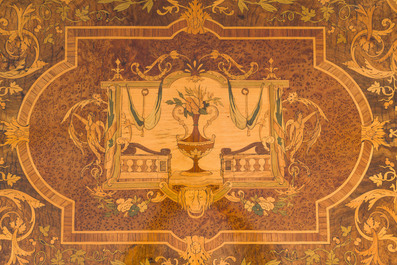 A French Napoleon III gilt bronze mounted partially ebonized wooden marquetry table with floral design and a theatre, 19th C.