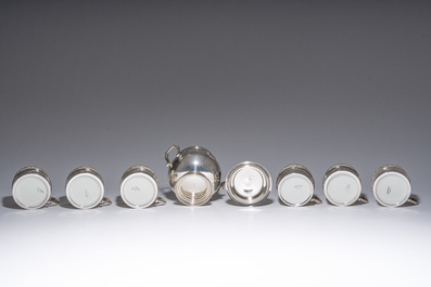 Six tasses en porcelaine de Limoges aux montures et soucoupes en argent et sucrier assorti, Delheid, 800/000, France et Belgique, 20&egrave;me si&egrave;cle