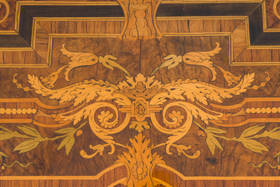 A French Napoleon III gilt bronze mounted partially ebonized wooden marquetry table with floral design and a theatre, 19th C.