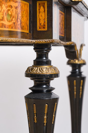 A French Napoleon III gilt bronze mounted partially ebonized wooden marquetry table with floral design and a theatre, 19th C.