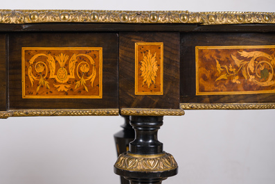 A French Napoleon III gilt bronze mounted partially ebonized wooden marquetry table with floral design and a theatre, 19th C.