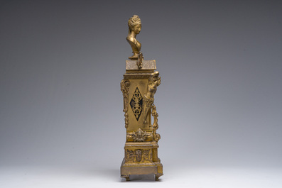 Pendule de chemin&eacute;e en bronze dor&eacute; surmont&eacute;e d'un buste de dame et d&eacute;cor&eacute;e par des plaques d'&eacute;mail &agrave; mascarons, France, 19&egrave;me si&egrave;cle
