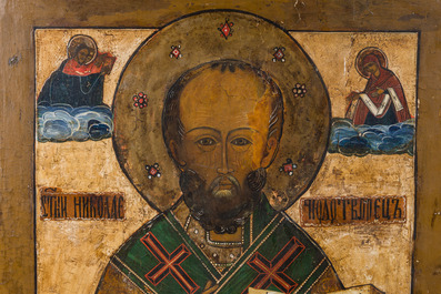 Cinq ic&ocirc;nes orthodoxes, e.a. 'L'Ascension d'Elie' et une ic&ocirc;ne de voyage en bronze &eacute;maill&eacute; en trois parties, Russie, 19&egrave;me si&egrave;cle