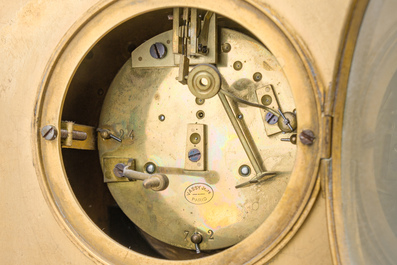 Pendule de chemin&eacute;e en bronze dor&eacute; surmont&eacute;e d'un buste de dame et d&eacute;cor&eacute;e par des plaques d'&eacute;mail &agrave; mascarons, France, 19&egrave;me si&egrave;cle