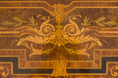 A French Napoleon III gilt bronze mounted partially ebonized wooden marquetry table with floral design and a theatre, 19th C.