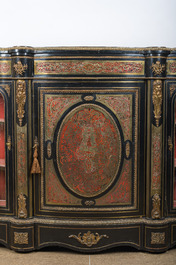 A French Historicism gilt bronze mounted tortoiseshell and brass marquetry ebonised wooden Boulle three-door credenza, 19th C.