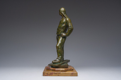 Constantin Emile Meunier (1831-1905): 'Le d&eacute;bardeur', bronze &agrave; patine verte sur un socle en marbre