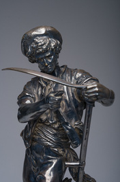 &Eacute;cole fran&ccedil;aise: Le r&eacute;mouleur, bronze argent&eacute; sur un imposant socle en marbre rouge, 19&egrave;me si&egrave;cle