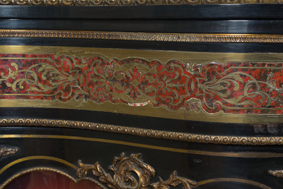 A French Historicism gilt bronze mounted tortoiseshell and brass marquetry ebonised wooden Boulle three-door credenza, 19th C.