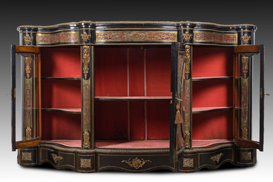 A French Historicism gilt bronze mounted tortoiseshell and brass marquetry ebonised wooden Boulle three-door credenza, 19th C.