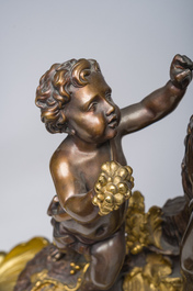 Impressionnante garniture de chemin&eacute;e en trois pi&egrave;ces en bronze dor&eacute; et patin&eacute; &agrave; d&eacute;cor de bacchante et bacchantes, France, 19&egrave;me si&egrave;cle