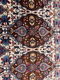 An important Persian Isfahan rug with floral design, wool on cotton, early 20th C.