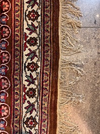 An important Persian Isfahan rug with floral design, wool on cotton, early 20th C.