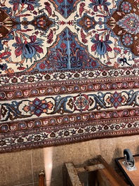 An important Persian Isfahan rug with floral design, wool on cotton, early 20th C.