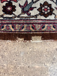 An important Persian Isfahan rug with floral design, wool on cotton, early 20th C.