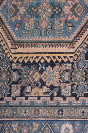 A Persian Hamadan rug with floral design, wool on cotton, 20th C.