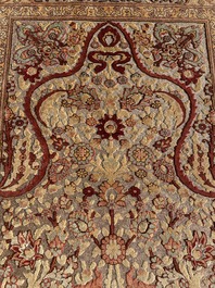 A Turkish Hereke rug with floral design in silk and gold thread, 20th C.